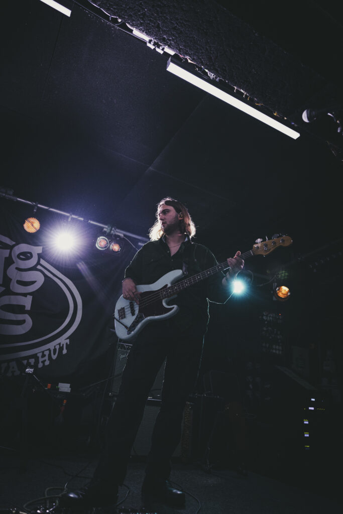 A live performance of The Fat Stacks on stage.