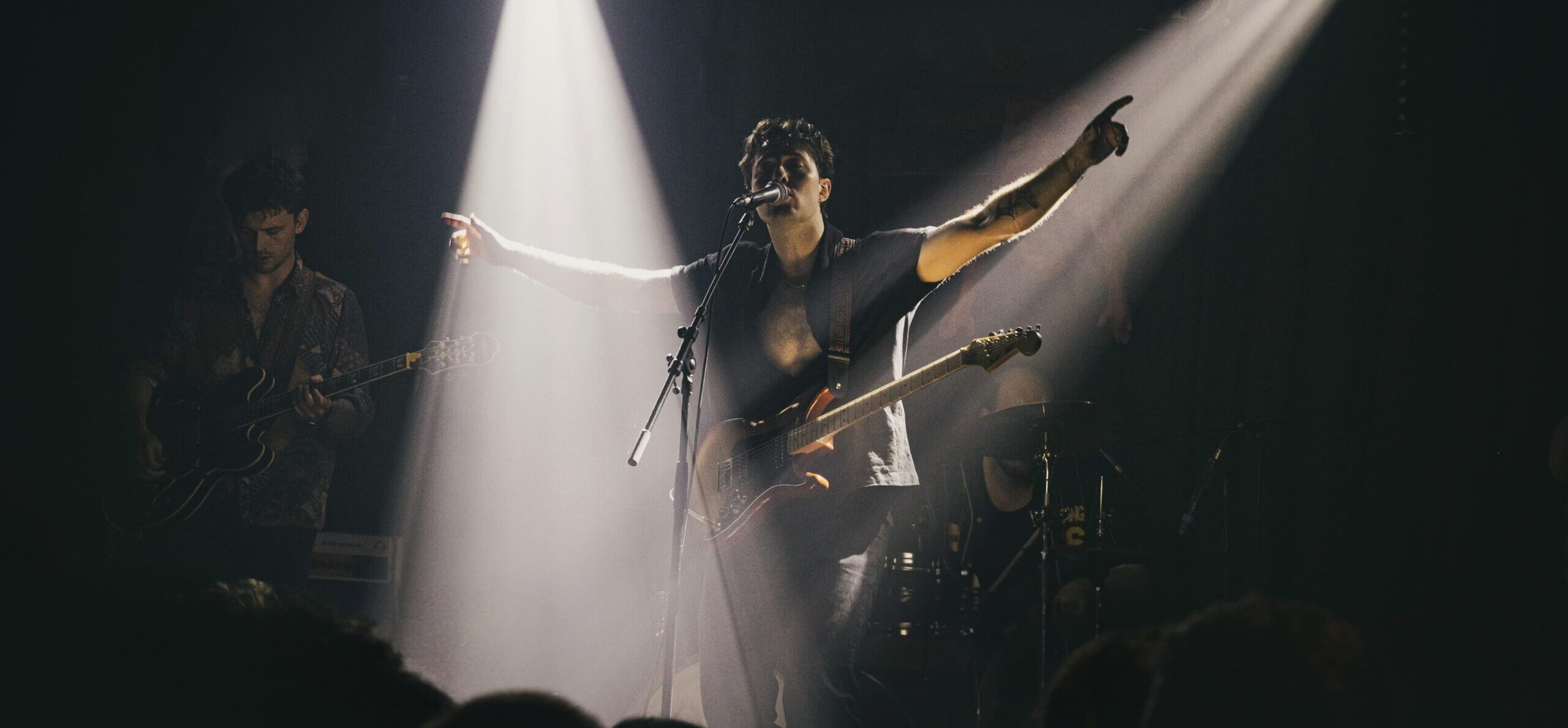 The Fat Stacks performing live on stage.